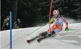  ?? ?? Petra Vlhova of Slovakia completes during the first run of Tuesday’s slalom in Flachau, Austria. Photograph: Hans Peter Lottermose­r/Getty Images