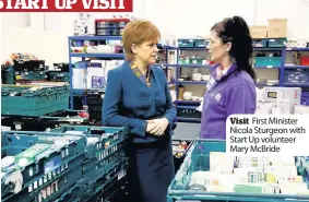  ??  ?? Visit First Minister Nicola Sturgeon with Start Up volunteer Mary McBride