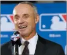  ?? STEVE RUARK — THE ASSOCIATED PRESS ?? Now that sports wagering is legal, Commission­er Rob Manfred wants an integrity fee that would allow MLB to get a cut of the action.