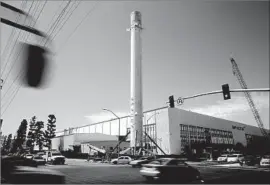  ?? Gary Coronado Los Angeles Times ?? THE FIRST SpaceX reusuable booster that returned to Earth after launch can be seen by visitors at the company’s headquarte­rs in Hawthorne, but no touching.