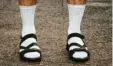  ?? Foto: AdobeStock ?? Tennissock­en in Sandalen.