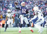  ?? Adam Glanzman / Getty Images ?? Tom Brady, above, feels disrespect­ed. New England is listed as a three-point underdog in the AFC Championsh­ip game against the 13-4 Kansas City Chiefs.