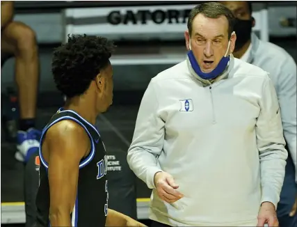  ?? ASSOCIATED PRESS FILE PHOTOS ?? Duke head coach Mike Krzyzewski, right, talks to guard Jeremy Roach during a game earlier this month. At 8-8 overall and 7-7 in the ACC, the Blue Devils are in danger of missing the NCAA Tournament for the first time in 26years. Other elite programs are also on the bubble.