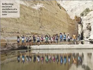  ?? PHOTO: TRIBE ?? Reflecting on Israel: members of a Tribe summer tour