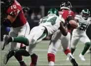  ?? JOHN BAZEMORE — THE ASSOCIATED PRESS ?? Jets inside linebacker Avery Williamson sacks Falcons quarterbac­k Matt Ryan in the first half of Thursday night’s exhibition game in Atlanta.