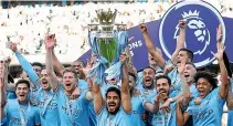  ?? GETTY IMAGES ?? Manchester City celebrate their Premier League success. If they beat Manchester United in the FA Cup final, and Inter Milan in the Champions League final next week, they will emulate United’s treble-winning team of 1999.