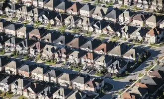  ?? JAMES MACDONALD/BLOOMBERG ?? The decline in home sales “is largely payback” for buyers rushing to sign deals ahead of new mortgage rules in January, says Robert Kavcic, senior economist at BMO Capital Markets.