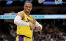 ?? Tom Pennington / Getty Images /TNS ?? The Los Angeles Lakers’ Russell Westbrook celebrates during second-half action against the Dallas Mavericks on Dec. 15.