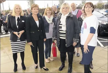  ?? ?? From left to right: Terrie Kennor from Demelza, store manager Glynis Gunning-Stevenson, first customer Anna Ward and Laura Kennedy from Action On Hearing at the opening