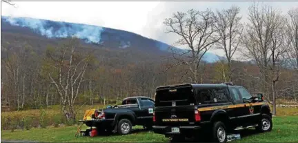  ?? TANIA BARRICKLO-DAILY FREEMAN ?? The fire at Sam’s Point Preserve as seen from the town of Shawangunk off of Mandell Road.