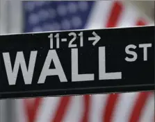  ?? Seth Wenig/Associated Press ?? Stocks closed lower Monday on Wall Street after a winning streak last week.