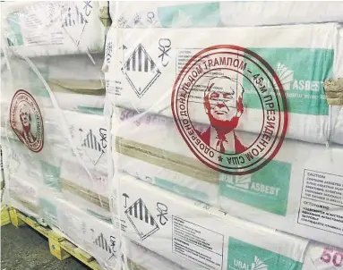  ?? URALASBEST/FACEBOOK ?? Uralasbest stamped Donald Trump's face on its asbestos shipments. Trump has called asbestos a “miracle mineral.”