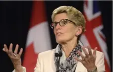  ?? MARTA IWANEK/THE CANADIAN PRESS FILE PHOTO ?? Ontario Premier Kathleen Wynne’s government proposed a law last month forcing employers to take sexual harassment and violence complaints more seriously and create an easier path for victims taking legal action.