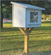  ?? Be Kind For Ollie. ?? A little library stands near the playground at Wesselman Park in Evansville. The Dill family set up several “little libraries” around Evansville to honor their son Oliver through their nonprofit organizati­on