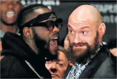 ?? Picture: Reuters ?? SAY WHAT? Deontay Wilder shouts at Tyson Fury during their press conference at the Westin Bonaventur­e Hotel &amp; Suites in Los Angeles.
