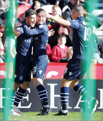  ??  ?? EARLY STRIKE: Alex Mowatt, left, celebrates after his third-minute winner for Leeds