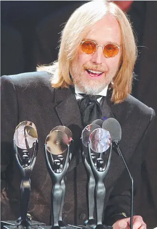  ?? Picture: AP ?? Tom Petty after being inducted into the Rock and Roll Hall of Fame. Petty died yesterday aged 66 after suffering a heart attack.