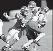  ?? Arkansas Democrat-Gazette/THOMAS METTHE ?? has played in several spots over his Arkansas career, but he seems to have found a home as the “Hog” linebacker in the Razorbacks’ 3-4 scheme.