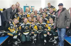  ?? THE CANADIAN PRESS ?? Members of the Humboldt Broncos junior hockey team in a photo posted to the team Twitter feed after a playoff win over the Melfort Mustangs last month.