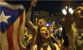  ??  ?? Catalans join a protest in Barcelona on Saturday night. Photograph: Etienne De Malglaive/Getty Images