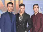  ?? JEAN-BAPTISTE LACROIX/AFP VIA GETTY IMAGES ?? The Jonas Brothers, from left, Joe, Nick and Kevin, took a tour break.