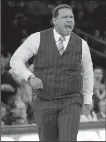  ?? AP/FRANK FRANKLIN II ?? Providence Coach Ed Cooley had to lead the second half and overtime of the Friars’ 76-66 loss to Villanova in the Big East Championsh­ip game Saturday with a towel tucked into his waist and draped over his backside after ripping his pants.