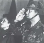  ?? UDO WEITZ AP file | Dec. 30, 1986 ?? In this 1986, file photo, then-Lt. Gen. Colin Powell, commander of the 5th U.S. corps, salutes while his wife Alma stands at attention during a farewell ceremony in Frankfurt, Germany.