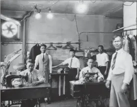  ?? Galt Museum photo ?? People inside Lee Duck Cleaners.