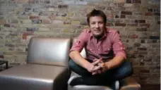  ?? MICHAEL STUPARYK/TORONTO STAR FILE PHOTO ?? Jamie Oliver, shown in a 2008 visit to Toronto, offers 100 “ultimate recipes” in Jamie’s Comfort Food.