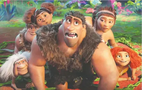  ??  ?? The gang is all back — albeit a lengthy seven years later — in the animated film The Croods: A New Age.