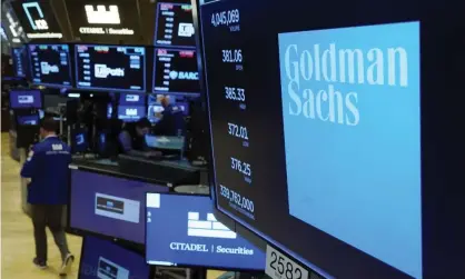  ?? Photograph: Richard Drew/AP ?? Goldman Sachs’ bankers will find out exactly how much they will personally collect for 2021 on Wednesday.