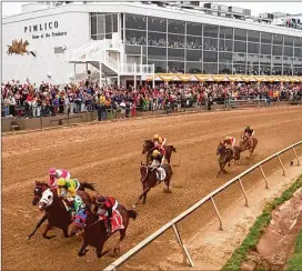  ?? DOUG KAPUSTIN / BALTIMORE SUN ?? Ten weeks after a study recommende­d the city, state and Pimlico Race Course owner negotiate over the track’s future, Baltimore leaders say they must battle to prevent the Preakness Stakes from ditching its home.