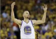  ?? MARCIO JOSE SANCHEZ — THE ASSOCIATED PRESS FILE ?? Golden State Warriors guard Stephen Curry (30) gestures after scoring against the Cleveland Cavaliers during Game 7 of basketball’s NBA Finals in Oakland. The Warriors gave up a 3-1 series lead and lost in 7 games.