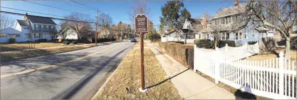  ?? Matthew Brown / Hearst Connecticu­t Media ?? Establishe­d in the late 1700s, Stamford’s Hubbard Heights neighborho­od is the first in the city in more than 25 years to be designated as a Historic District by the National Park Service. A marker honoring its designatio­n sits on Hubbard Avenue in Stamford.