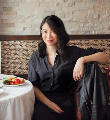  ??  ?? Hui at Taste of China restaurant: her book is part history, part memoir, part road trip