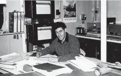  ?? ?? Peter Macdonald working in the Scott Base laboratory in 1957. The two solar radiation recorders are behind him.