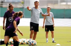  ??  ?? Phil Neville at a training session at the Pierre de Coubertin stadium in Cannes on Tuesday ahead of England’s match against Japan. Photograph: Sébastien Nogier/EPA