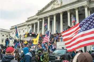  ?? JASON ANDREW/THE NEW YORK TIMES ?? Supporters of then-President Donald Trump storm the U.S. Capitol on Jan. 6, 2021.