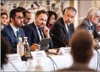  ?? — AFP ?? President of COP28 Sultan Ahmed Al Jaber, Danish Minister for Global Climate Policy Dan Joergensen and the future COP30 Chairman Andre Aranha Correa do Lago attend the Climate Minister Meeting in Helsingoer, Denmark, on Thursday.