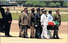  ??  ?? LAST JOURNEY: Military generals carry the coffin of former president Nelson Mandela to the plane that transporte­d it from Pretoria to the Eastern Cape for burial