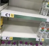 ??  ?? Out-ofstock: Volvic water six-packs were sold out at Tesco Clarehall in north Dublin
