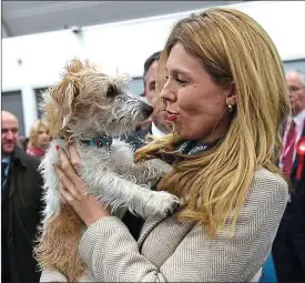  ??  ?? Mischief: the Prime Minister’s fiancée Carrie Symonds with rescue terrier Dilyn