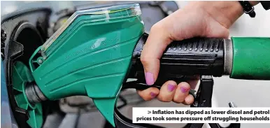  ?? ?? Inflation has dipped as lower diesel and petrol prices took some pressure off struggling households