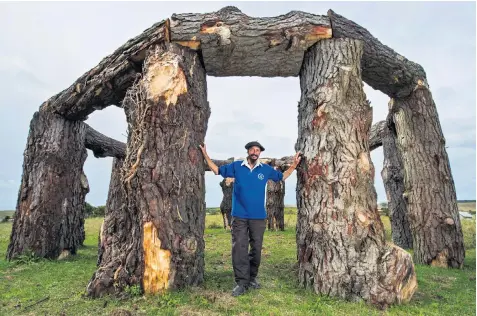  ??  ?? Charlie Newman, landlord of the Square and Compass, top, with his woodhenge. A newly discovered rat-like mammal, illustrate­d below left, has been named after him