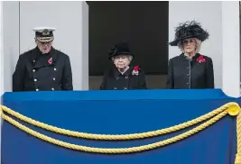  ?? JACK TAYLOR/GETTY IMAGES ?? Prince Philip, Duke of Edinburgh, Queen Elizabeth II and Camilla, Duchess of Cornwall attend the annual Remembranc­e Sunday memorial in London.