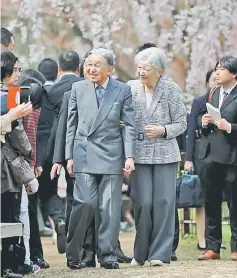  ??  ?? Japan’s Emperor Akihito (left) ad Empress Michiko admire cherry blossoms at Kyoto Gyoen National Garden in Kyoto. — AFP photo