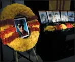  ??  ?? A wreath honoring Ly Tong, a former South Vietnamese Air Force pilot and anticommun­ist activist in San Jose who died in April, stands near an exhibit honoring other fallen South Vietnamese soldiers.