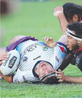  ?? Picture: AAP IMAGE ?? Storm’s Dale Finucane is brought down by the Warriors defence.