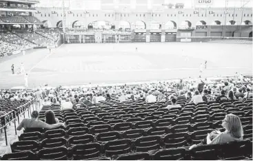  ?? Smiley N. Pool / Houston Chronicle ?? Astros fan Greis Perez takes in about 70 games at Minute Maid Park each season, and when the team is struggling as it is this year, the stadium can have an empty feeling to it.