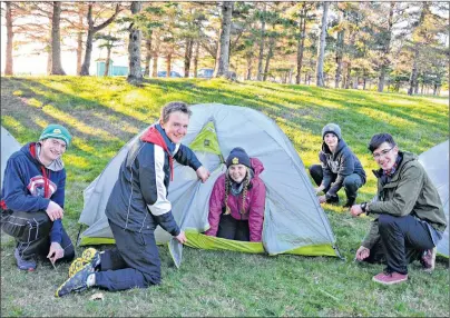  ?? DESIREE ANSTEY/JOURNAL PIONEER ?? Team P.E.I., from left, Josh Ford, Colton Bulger, Molly Madore, William Forsyth, and Jonathan Ford set up camp for the night at Linkletter Provincial Park.